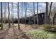 Large backyard featuring a deck and mature trees and lush foliage at 810 Bridgewood Dr, Rock Hill, SC 29732