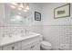 Clean bathroom showcasing white subway tiles, stylish sink and vanity at 810 Bridgewood Dr, Rock Hill, SC 29732