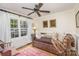 Cozy bedroom featuring a daybed, plush area rug, and bright window at 810 Bridgewood Dr, Rock Hill, SC 29732