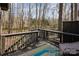 This deck overlooks the property's beautiful trees and peaceful landscape at 810 Bridgewood Dr, Rock Hill, SC 29732
