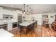 Well-lit kitchen with large island, stainless steel appliances, white cabinetry, and subway tile backsplash at 810 Bridgewood Dr, Rock Hill, SC 29732