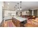 Spacious kitchen with island, stainless steel appliances, and an open layout to the living room at 810 Bridgewood Dr, Rock Hill, SC 29732