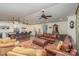 Spacious living room showing the kitchen with central island, hardwood floors, and natural light at 810 Bridgewood Dr, Rock Hill, SC 29732