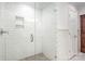 Bathroom shower featuring elegant white subway tile, glass door, and refined fixtures at 810 Bridgewood Dr, Rock Hill, SC 29732