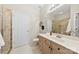 Well-lit bathroom with neutral vanity, updated sink and decorative mirror and a glass enclosed shower at 921 Northeast Dr # 26, Davidson, NC 28036