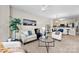 Bright living room and kitchen, with an open layout, feature plenty of natural light and neutral color palette at 921 Northeast Dr # 26, Davidson, NC 28036