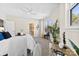 Bright bedroom with a lake view, featuring a bed, desk, and relaxing sitting area at 921 Northeast Dr # 26, Davidson, NC 28036