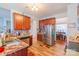 Spacious kitchen featuring stainless steel appliances and dark wood cabinets at 10406 Little Whiteoak Rd, Charlotte, NC 28215