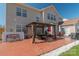 Enjoy the outdoors in this home's spacious backyard patio and gazebo at 10406 Little Whiteoak Rd, Charlotte, NC 28215