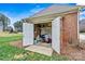 Attached garage offers extra storage and complements the brick exterior of this charming home at 106 Wolf Hill Dr, Mooresville, NC 28117