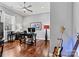 Office area with dark desk, gray walls, and hardwood flooring at 106 Wolf Hill Dr, Mooresville, NC 28117