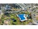 Aerial view of community pool with playground and picnic area at 12028 Regal Lily Ln, Huntersville, NC 28078