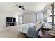 Serene main bedroom with a ceiling fan, soft carpet, and ample natural light at 12028 Regal Lily Ln, Huntersville, NC 28078