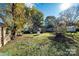 Spacious backyard with mature trees and space for recreation at 1216 E Cedar Ave, Gastonia, NC 28054