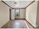 Neutral walls, hardwood floors, trim, and window fill this room with light at 1216 E Cedar Ave, Gastonia, NC 28054