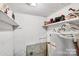 Water heater and shelving highlight this storage room at 1216 E Cedar Ave, Gastonia, NC 28054