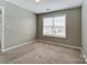 Bedroom featuring carpet flooring and natural light from a window at 12332 Ridge Cove Cir, Charlotte, NC 28273