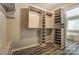 Large walk-in closet offering custom shelving and plenty of storage space at 12332 Ridge Cove Cir, Charlotte, NC 28273