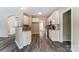 Bright kitchen featuring stainless appliances, light cabinets, and open access to dining and living areas at 12332 Ridge Cove Cir, Charlotte, NC 28273