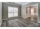 Inviting living room featuring a large window offering plenty of natural light at 12332 Ridge Cove Cir, Charlotte, NC 28273