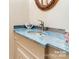 Bathroom featuring neutral walls, unique tile countertop, and vintage sink at 1359 Carmen Ln, Gastonia, NC 28054