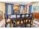 Formal dining room featuring elegant drapery, vintage decor, and a large window at 1359 Carmen Ln, Gastonia, NC 28054