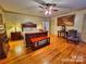 Spacious main bedroom with hardwood floors and traditional decor at 1359 Carmen Ln, Gastonia, NC 28054