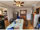 Eat-in kitchen features stainless steel refrigerator and a decorative china cabinet at 1377 S Aspen St, Lincolnton, NC 28092