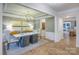Elegant dining room with modern chandelier, stylish decor, and neutral tones for sophisticated meals at 13935 Penbury Ln # 378, Charlotte, NC 28278