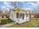 Quaint one-story home with a covered front porch and easy access from the sidewalk at 1893 Hilltop Cir, Gastonia, NC 28054