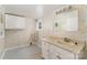 Laundry room featuring vanity, sink, mirror, and patterned wallpaper at 1893 Hilltop Cir, Gastonia, NC 28054