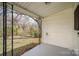 Covered porch with metal railings, perfect for enjoying the outdoors at 1893 Hilltop Cir, Gastonia, NC 28054