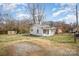 Fenced yard with a small storage shed at 1893 Hilltop Cir, Gastonia, NC 28054