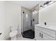 Modern bathroom features a glass shower, black fixtures and stylish vanity at 1915 Kingston Dr, Gastonia, NC 28052