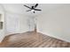 Spacious bedroom features wood floors, ceiling fan and ample closet space at 1915 Kingston Dr, Gastonia, NC 28052