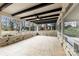 Screened porch features brick, white trim and a ceiling fan at 1915 Kingston Dr, Gastonia, NC 28052