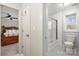 Modern bathroom featuring a tiled shower over tub and neutral color palette at 20338 Christofle Dr, Cornelius, NC 28031