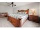 Spacious bedroom featuring a wooden bed frame, and matching bedside tables with carpeted floors at 20338 Christofle Dr, Cornelius, NC 28031