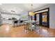 Bright and airy kitchen with an island, bar seating, modern appliances, and natural light at 20338 Christofle Dr, Cornelius, NC 28031