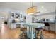 Spacious kitchen with a built-in bar area and an island with counter seating at 20338 Christofle Dr, Cornelius, NC 28031