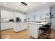 Bright kitchen with white cabinets, granite countertops, stainless appliances, and a window view at 20338 Christofle Dr, Cornelius, NC 28031