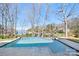 Stunning backyard pool with tranquil lake views creating a private oasis for relaxation and enjoyment at 20338 Christofle Dr, Cornelius, NC 28031