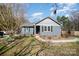 Charming single-story home with blue siding, walkway, and front yard landscaping at 240 Old Limestone E Rd, York, SC 29745