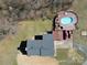 Aerial view of the house, pool, deck, and surrounding property at 257 Hickory Hill Ln, Stanley, NC 28164