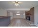 Spacious basement with brick fireplace, and bar area for entertaining at 257 Hickory Hill Ln, Stanley, NC 28164