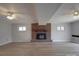 Spacious basement with brick fireplace and neutral colors at 257 Hickory Hill Ln, Stanley, NC 28164