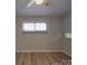 Well lit bedroom features two large windows and light wood flooring at 257 Hickory Hill Ln, Stanley, NC 28164