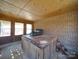 Enclosed hot tub room with brick walls and wood ceiling detail at 257 Hickory Hill Ln, Stanley, NC 28164