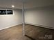 Finished basement offers versatile space with durable floors and natural light from a window at 424 20Th Ne Ave, Hickory, NC 28601