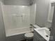 Clean bathroom with modern fixtures, white vanity, and shower-tub combination at 424 20Th Ne Ave, Hickory, NC 28601